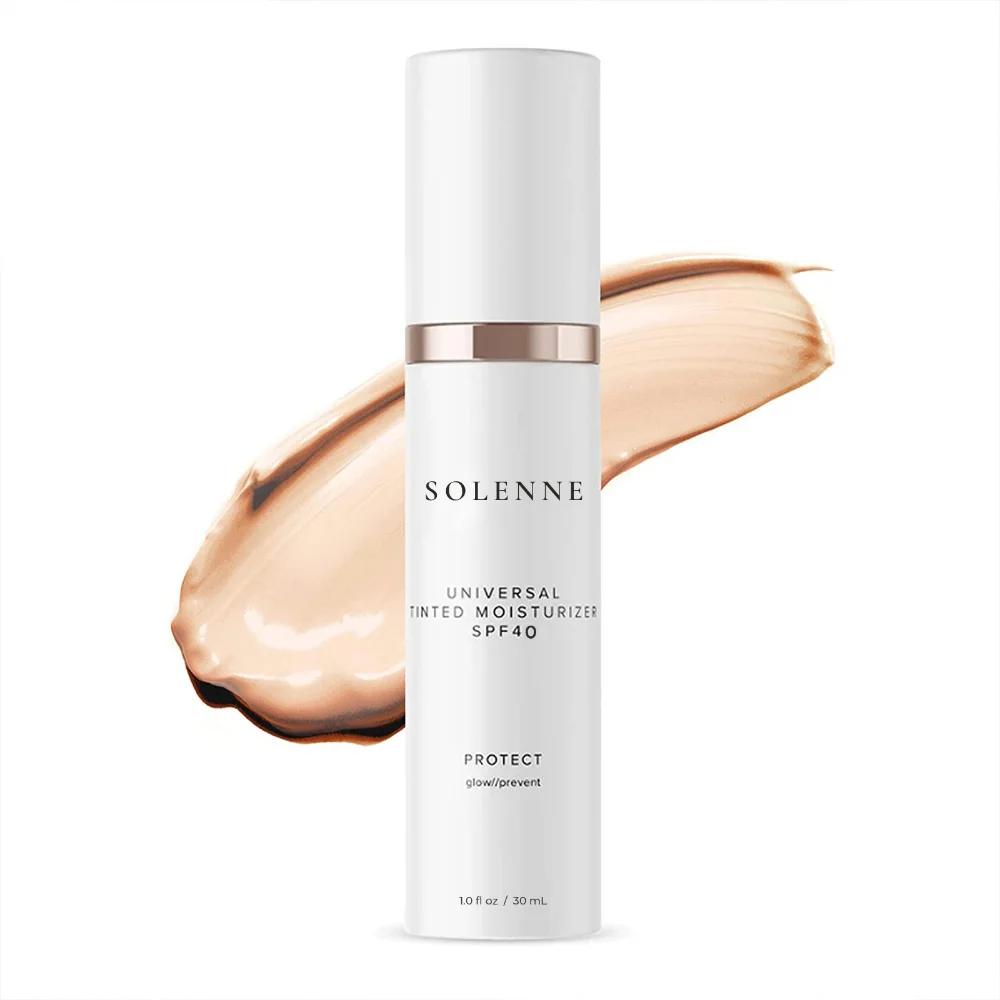 Solenne tinted moisturizer bottle beside a swatch of the tinted lotion